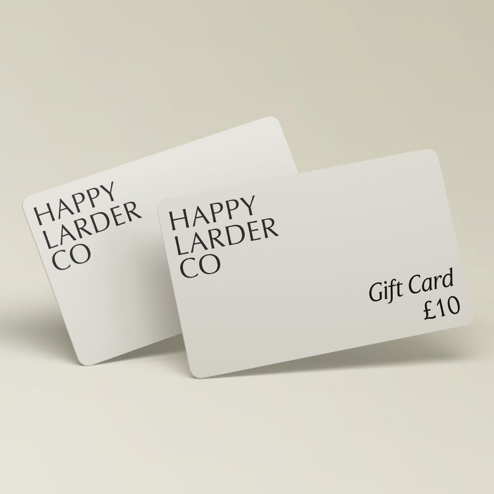 Two 'Happy Larder Co' gift cards on a light beige background
